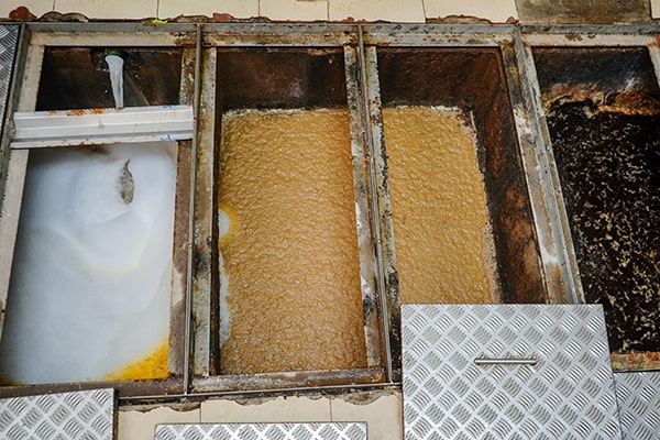 neglecting grease trap maintenance can lead to foul odors, blockages, and sewage backups in your establishment